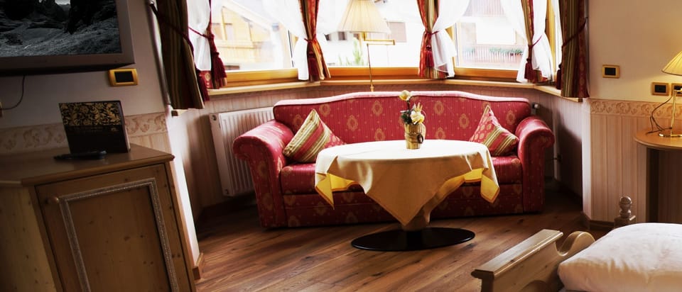 Superior Double Room, Balcony, Mountain View | Living area | Flat-screen TV