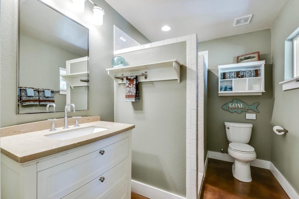 Full bathroom located near living room. 