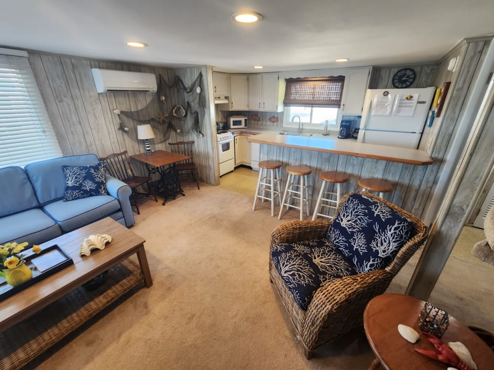 RELAX IN COMFORTABLE LIVING ROOM, ENTER VIA SCREENED PORCH



