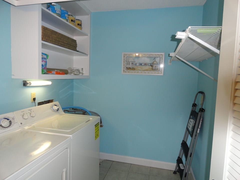 Full size laundry room with plenty of storage for your beach toys, etc.