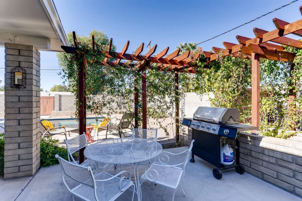 Outdoor BBQ grill area near pool