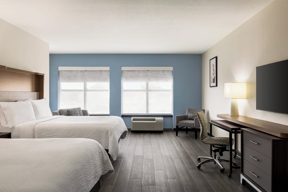 Pillowtop beds, desk, laptop workspace, blackout drapes