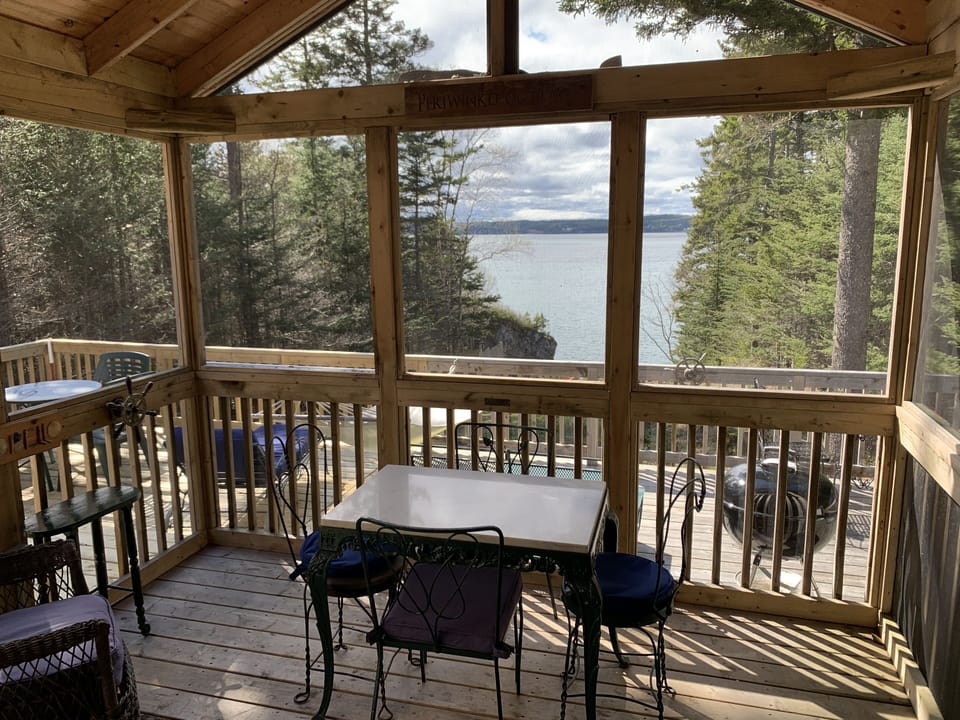 Inside the screen room overlooking the ocean