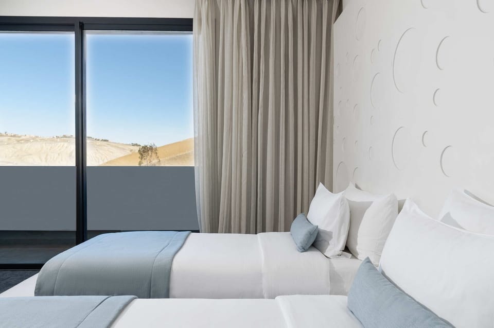 Superior Twin Room | Minibar, in-room safe, desk, blackout drapes
