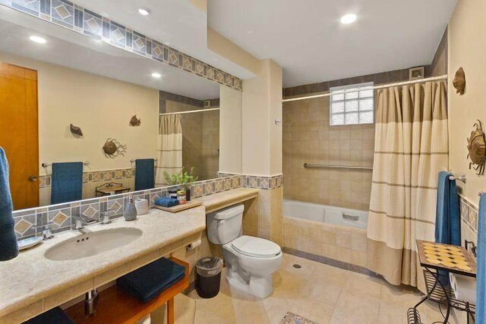 Largest bathroom with shower/tub with plush linens blow dryer and extra toiletries
