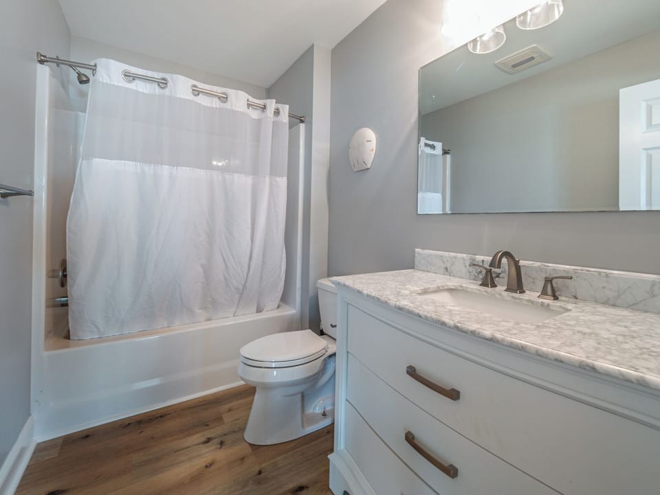 Third Bathroom - Shower/Tub Combo, Hallway Access - First Floor