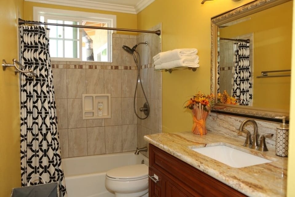 Bathroom #1 with bathtub, premium vanity with granite vanity top