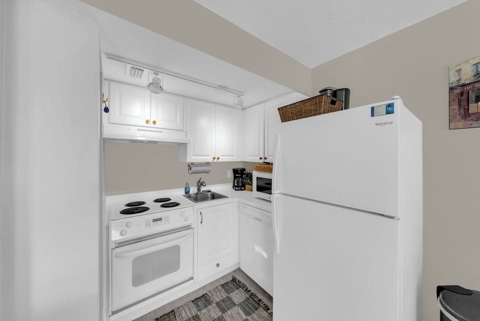 Full kitchen.  Stove, oven, microwave, all utensils Keurig coffee maker