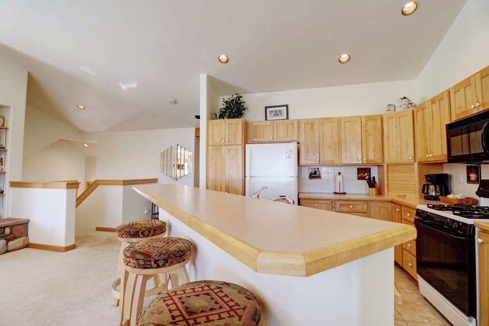 Barstool seating in the kitchen.