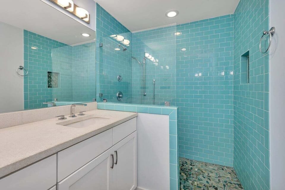 Primary bathroom with vanity and walk-in shower