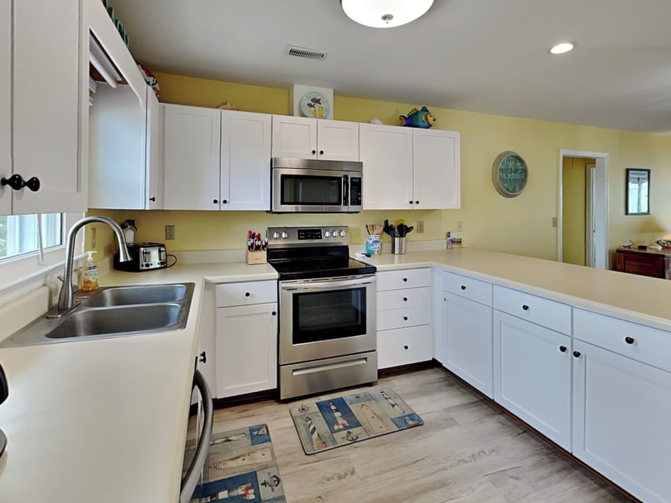 Fully Equipped Kitchen with Stainless Steel Appliances