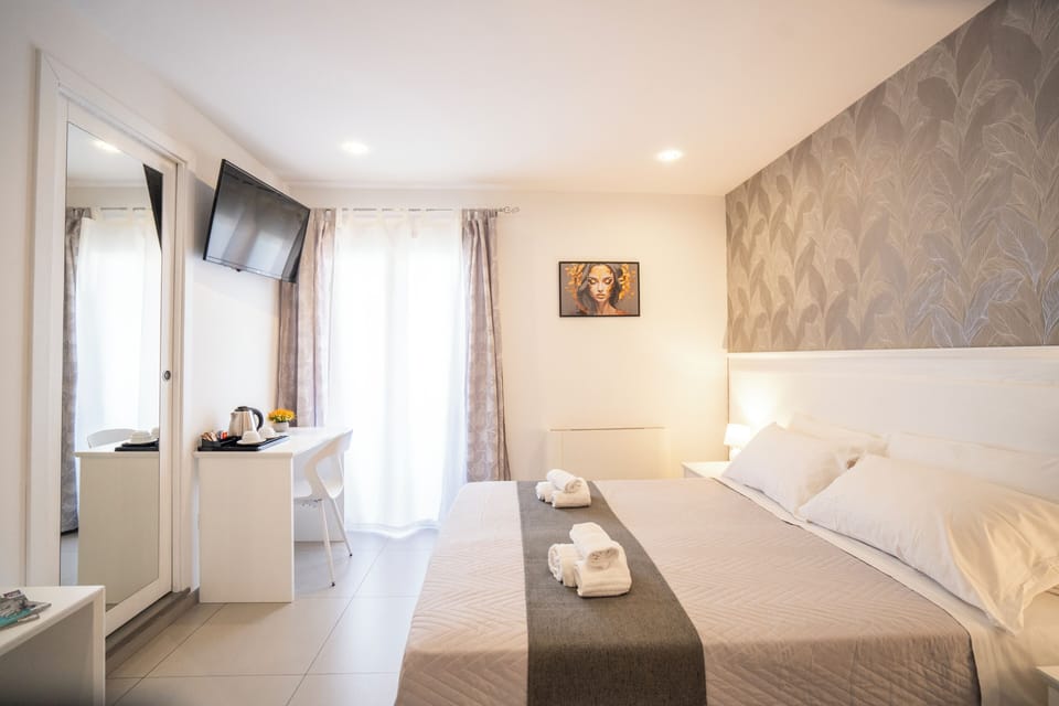 Quadruple Room, Balcony | In-room safe, soundproofing, WiFi (free), bed sheets