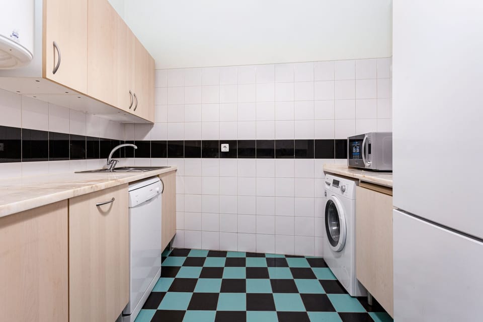 Standard Apartment, 2 Bedrooms, City View | Private kitchenette | Fridge, microwave, oven, stovetop