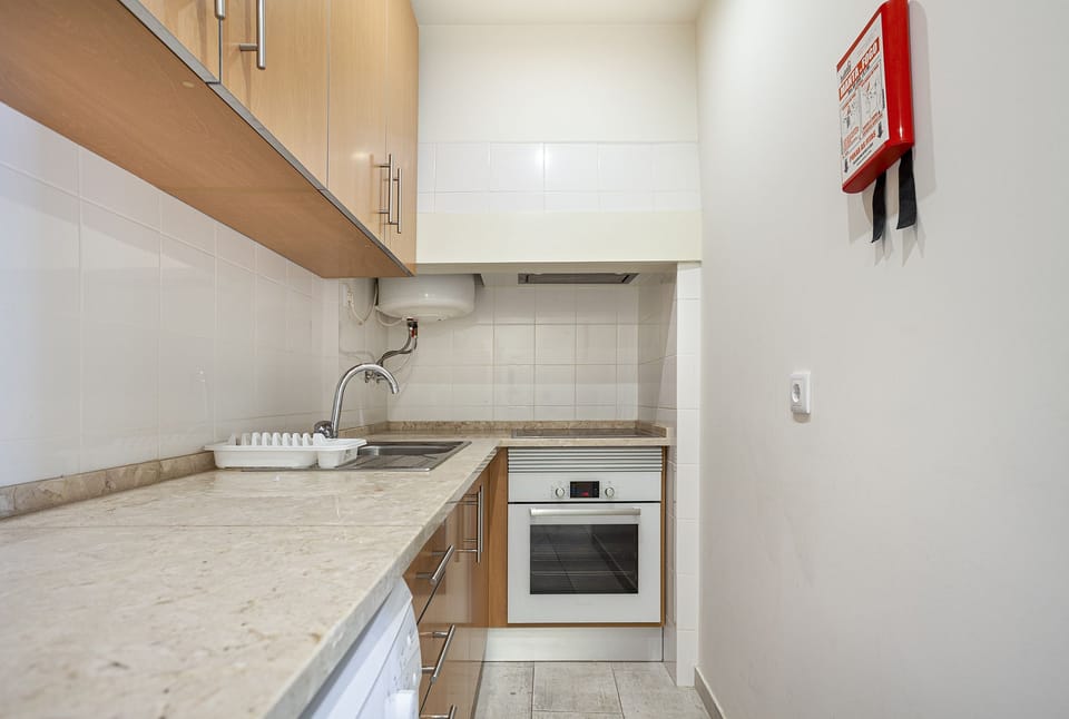 Standard Apartment, 2 Bedrooms, Balcony, City View | Private kitchen | Full-size fridge, microwave, oven, stovetop