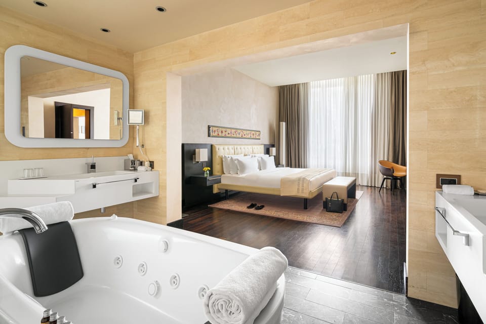 Signature Suite | Premium bedding, minibar, in-room safe, desk