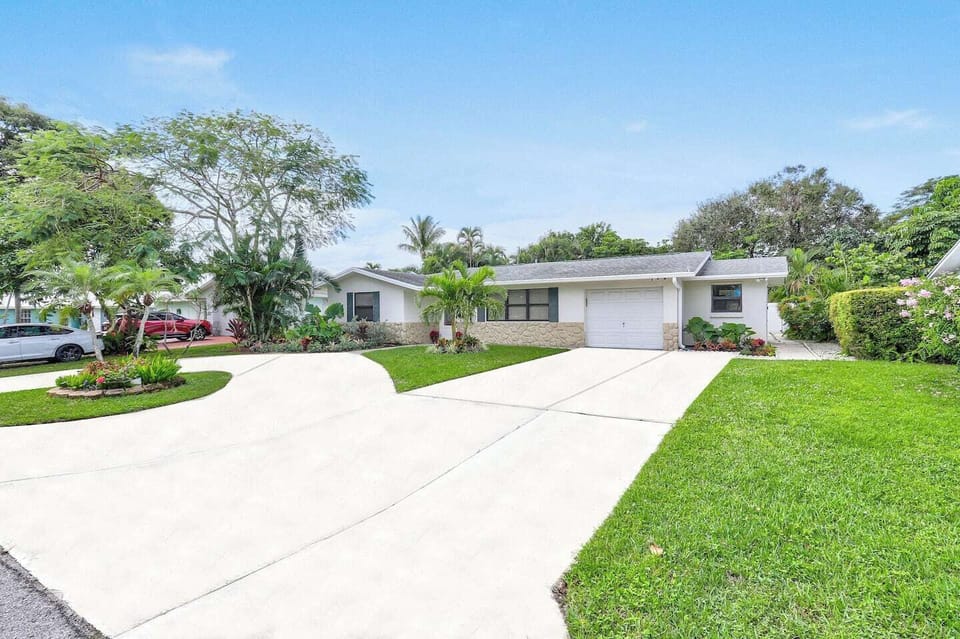 Parking and Separate Private Entrance Behind The Garage