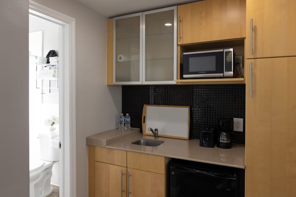 Mini-fridge, microwave, coffee/tea maker, toaster