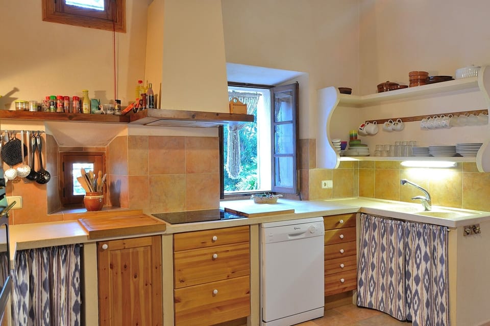 The kitchen of the villa has room for 8 people