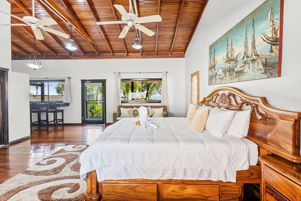 King size bed, kitchenette and ocean views
