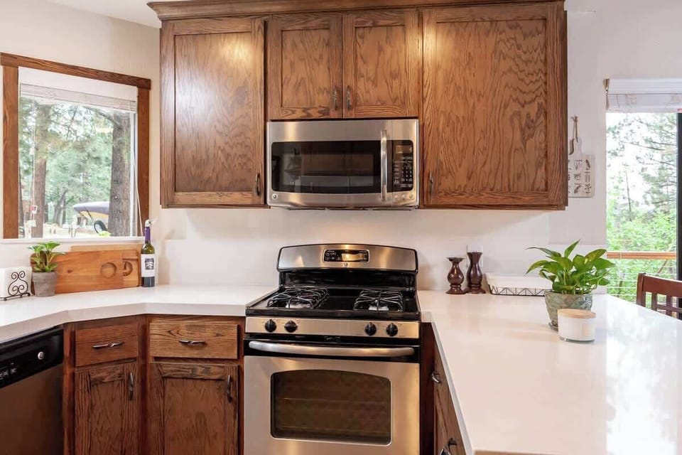 Prepare your favorite meal in the bright kitchen.