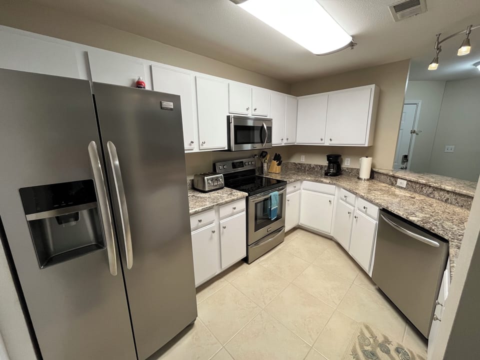 Kitchen with modern appliances & toaster, blender, Keurig & drip coffee maker