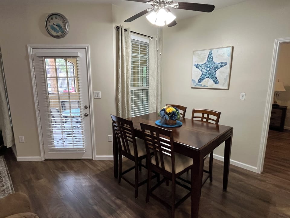 Dining Area for four - ceiling fan & access door to screened-in patio