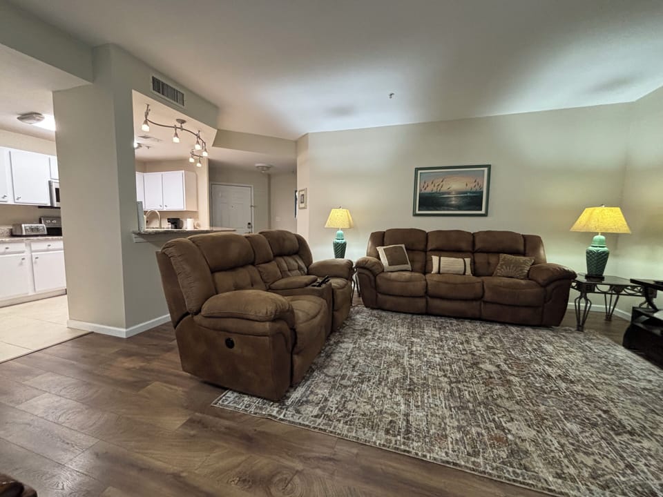 Living Room - Couch with end recliners, theatre seat with two power recliners.