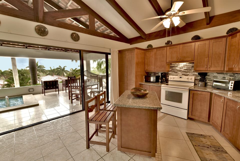 Light & Bright with these huge windows and vaulted ceilings.