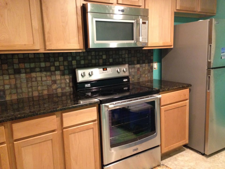 All new kitchen! New counter tops, back splash and appliances