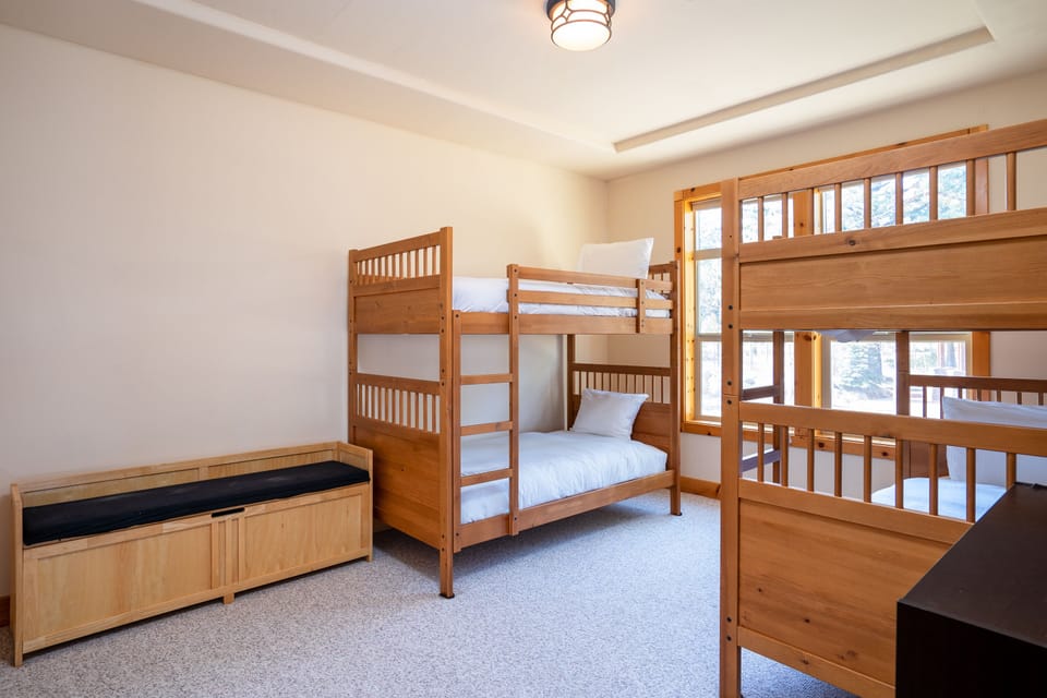 Great kids room with 2 sets of twin bunk beds. Located off family/entertainment room next to the jack and jill bathroom. 