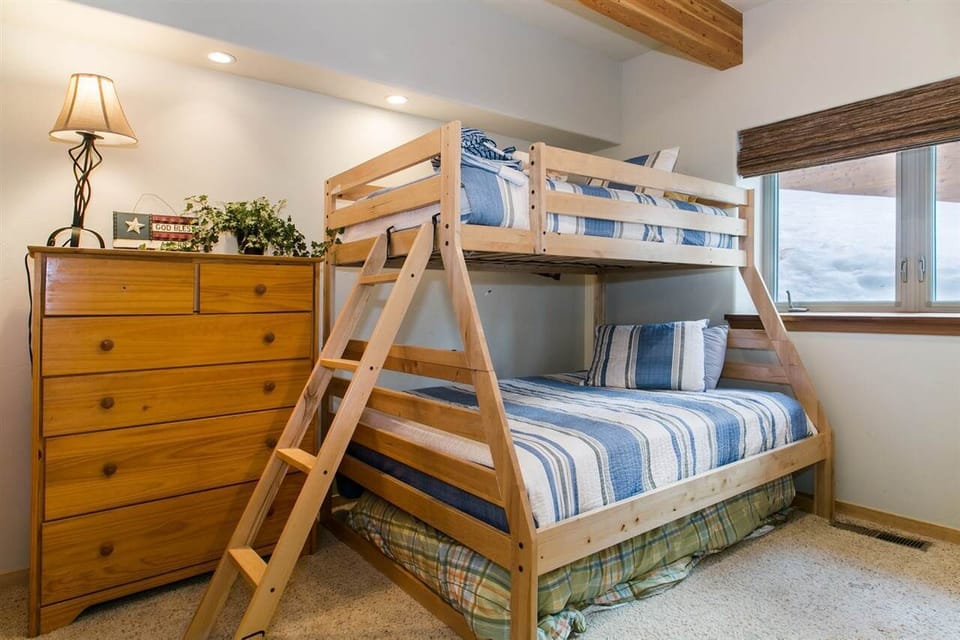Bunk bed set with twin and full size bed, bath is shared and also connects to room