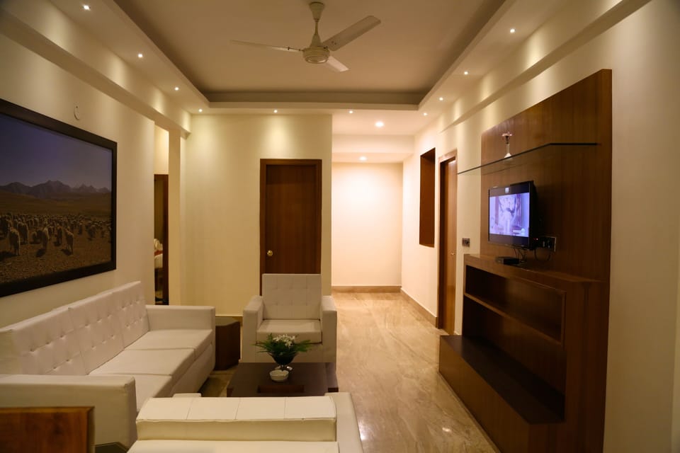 Presidential Suite, City View | Living area | Flat-screen TV