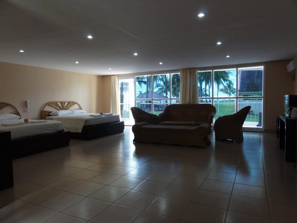 Suite | Desk, bed sheets