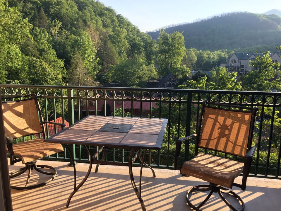 Mountain view from balcony, afternoon full sun exposure
