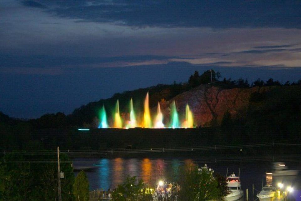 Nightly view of musical fountain in the summer from living room and top balcony