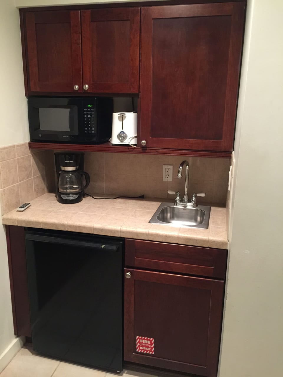 Efficiency side kitchenette area.