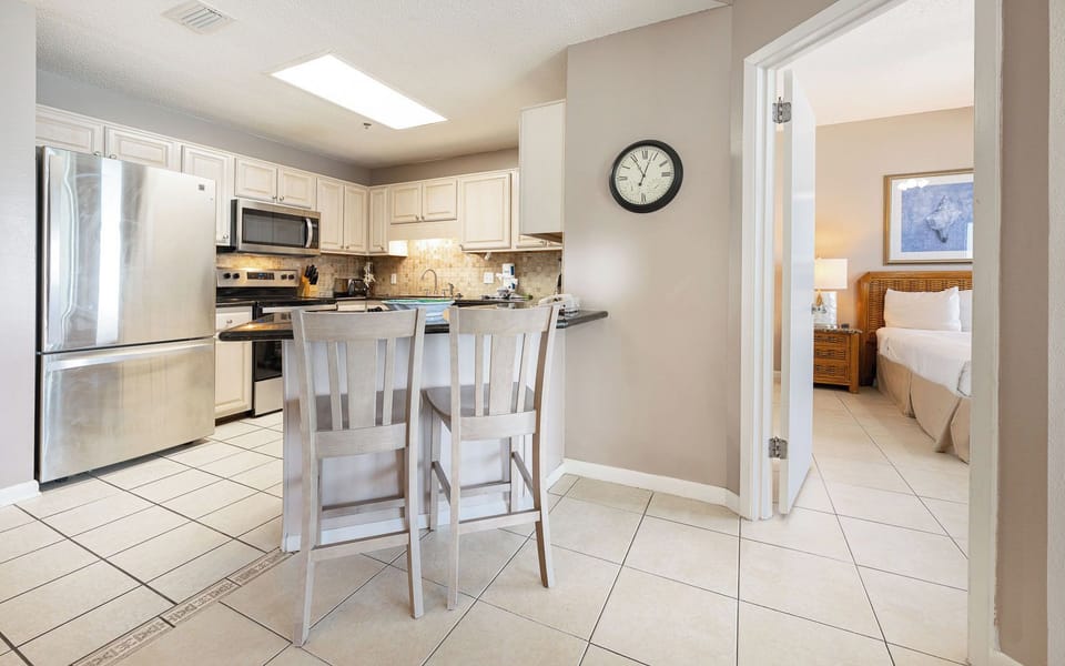Gather at the bar stools and plan your day's adventure while enjoying the comforts of your cozy kitchen space