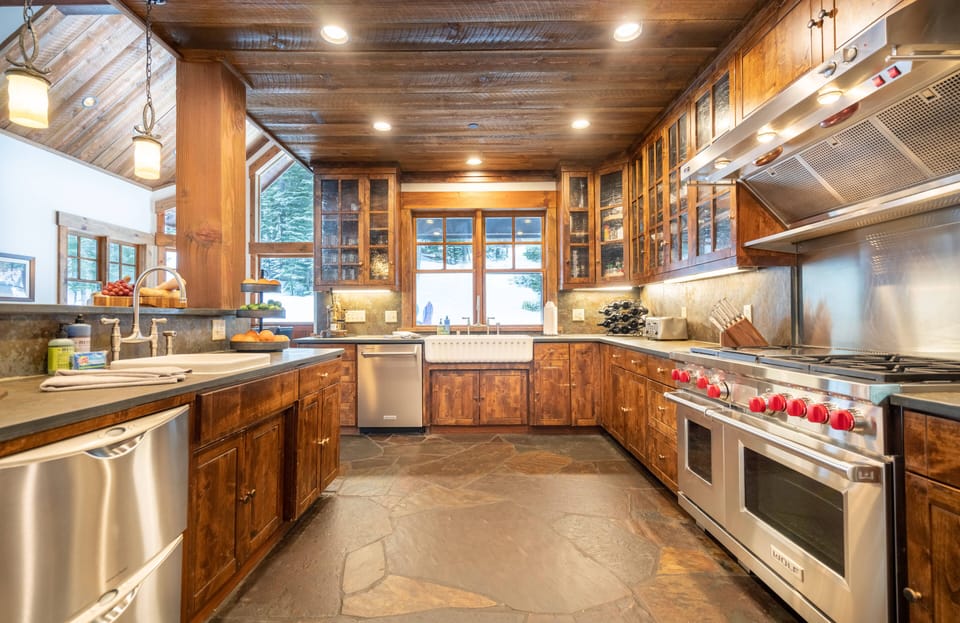 Gourmet kitchen complete with 3 ovens and a 8 burner Wolf range