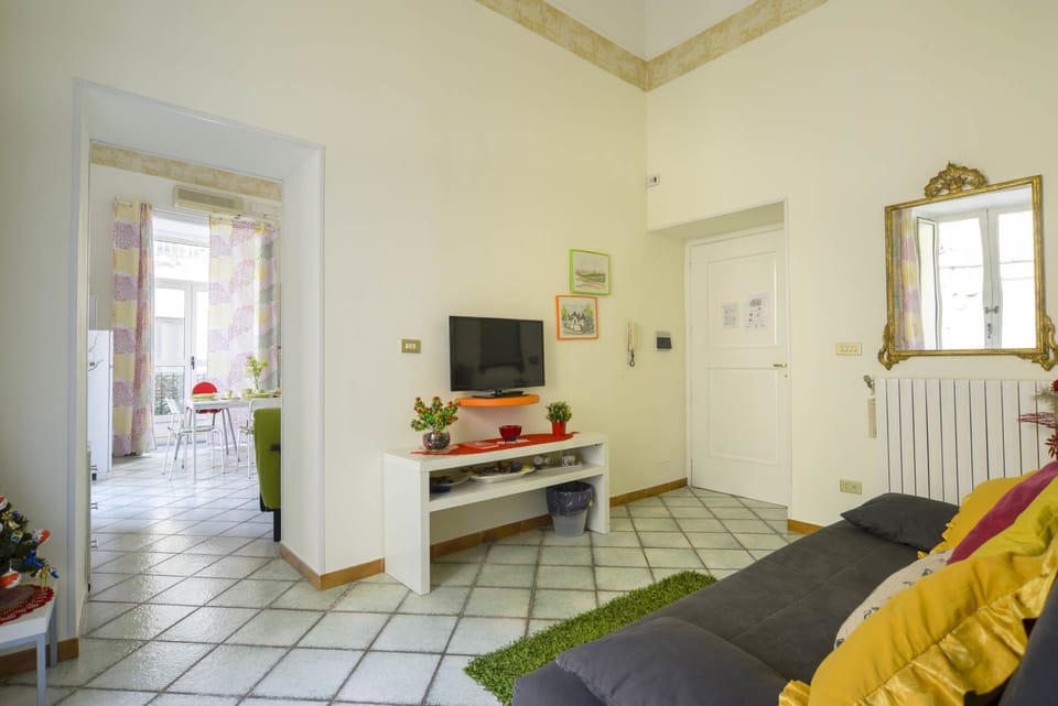 Deluxe Apartment, City View | Living area | Flat-screen TV