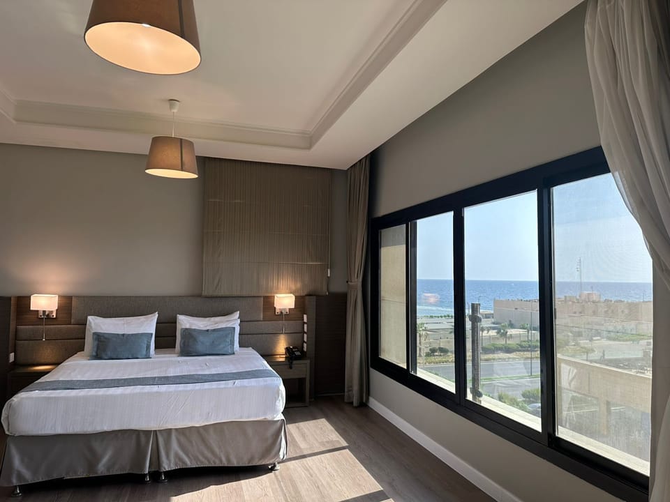 Apartment, 1 Bedroom, Sea View | In-room safe, soundproofing, iron/ironing board, free WiFi