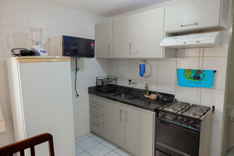 Family Apartment | Private kitchen | Fridge, microwave, oven, stovetop