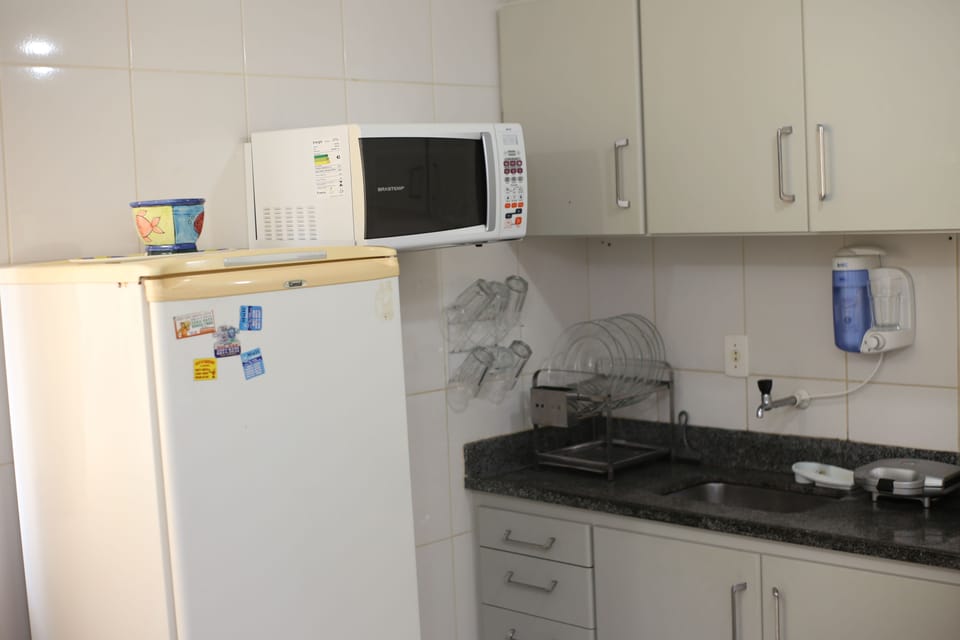 Family Apartment | Private kitchen | Fridge, microwave, oven, stovetop