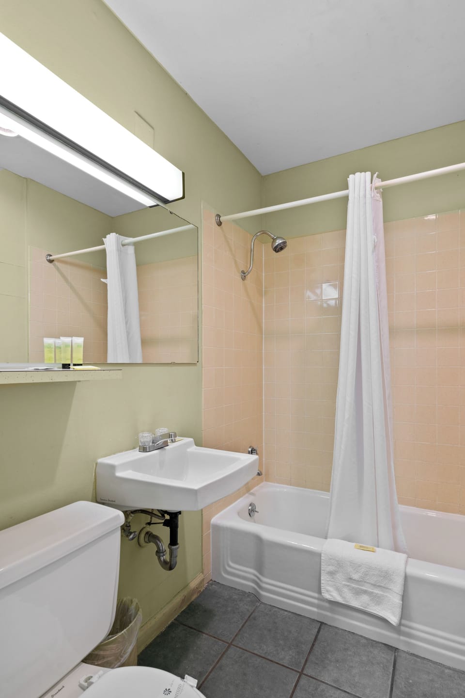 Suite, 1 King Bed | Bathroom | Combined shower/tub, hair dryer, bathrobes, towels
