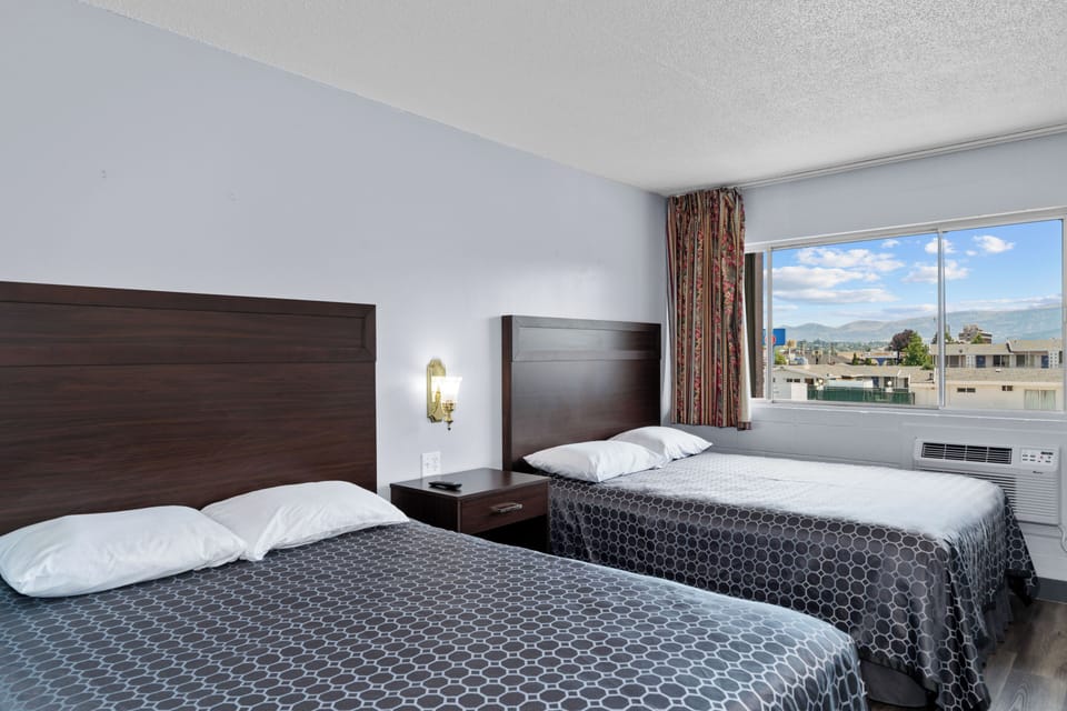 Room, 2 Queen Beds | Desk, soundproofing, iron/ironing board, free WiFi