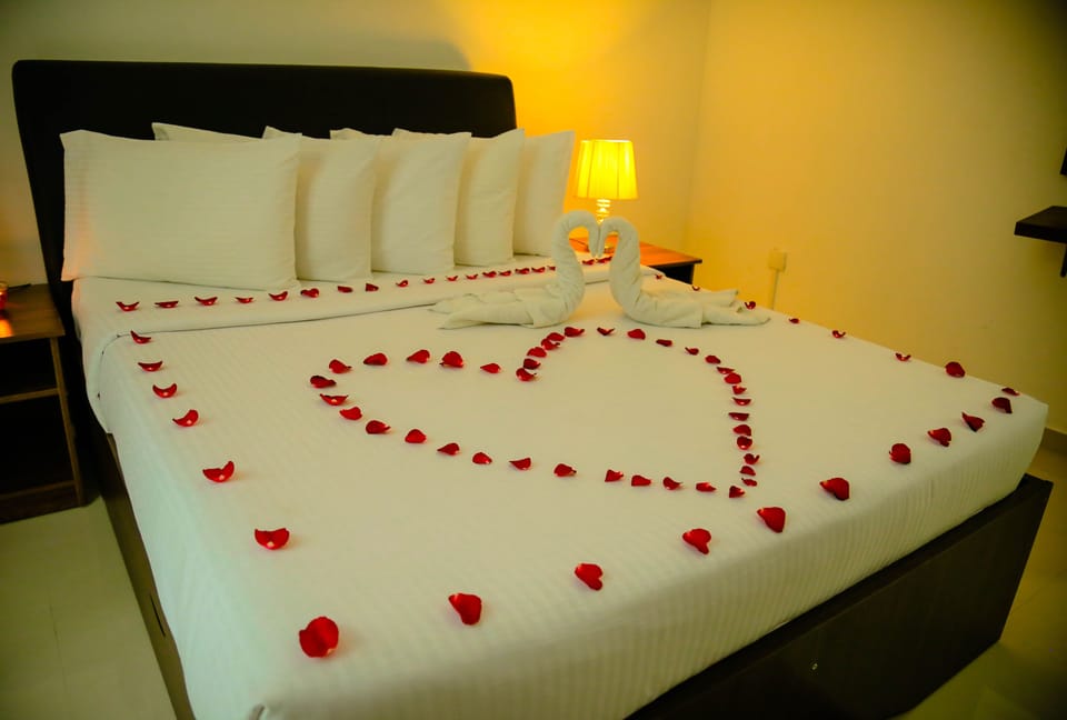 Deluxe Double Room, Pool View | In-room safe, desk, soundproofing, iron/ironing board