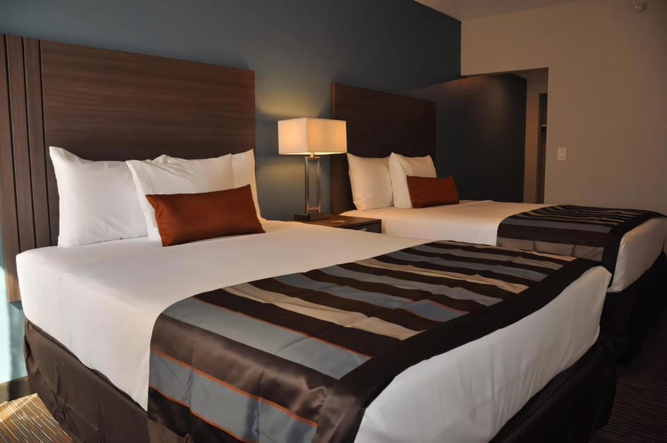Premium Room, 2 Queen Beds | In-room safe, iron/ironing board, free WiFi, bed sheets
