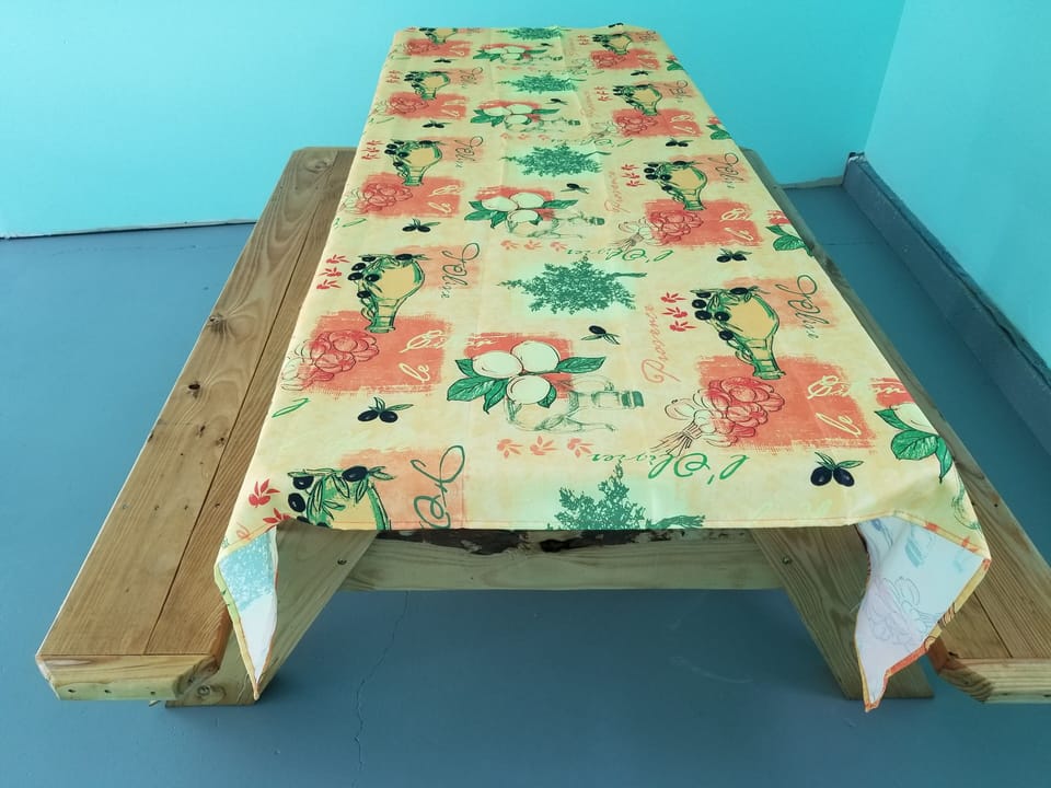 6 foot picnic table and ping pong table in attached garage. Bike storage also.