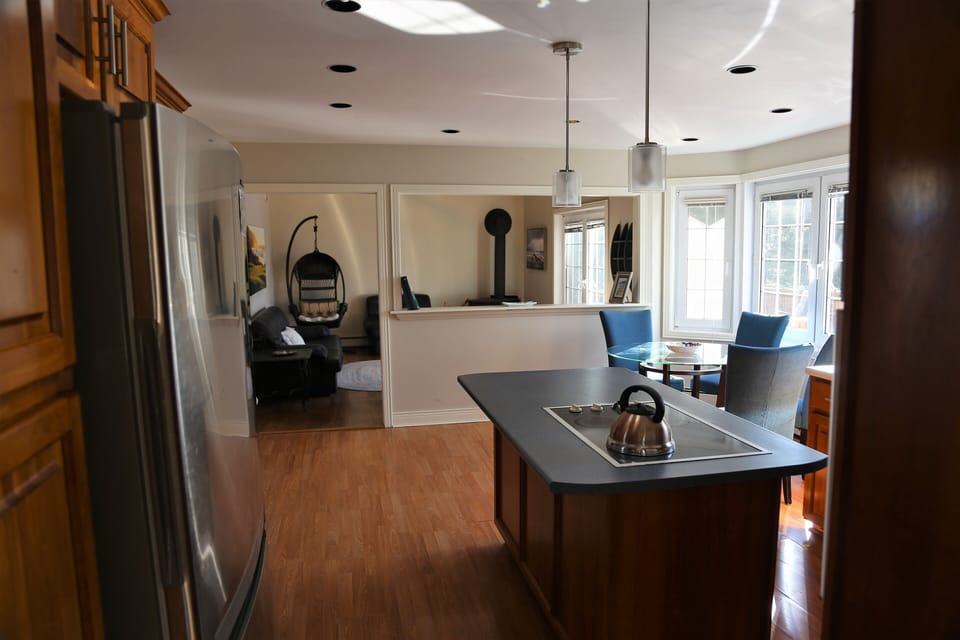 Kitchen looking towards sunroom.