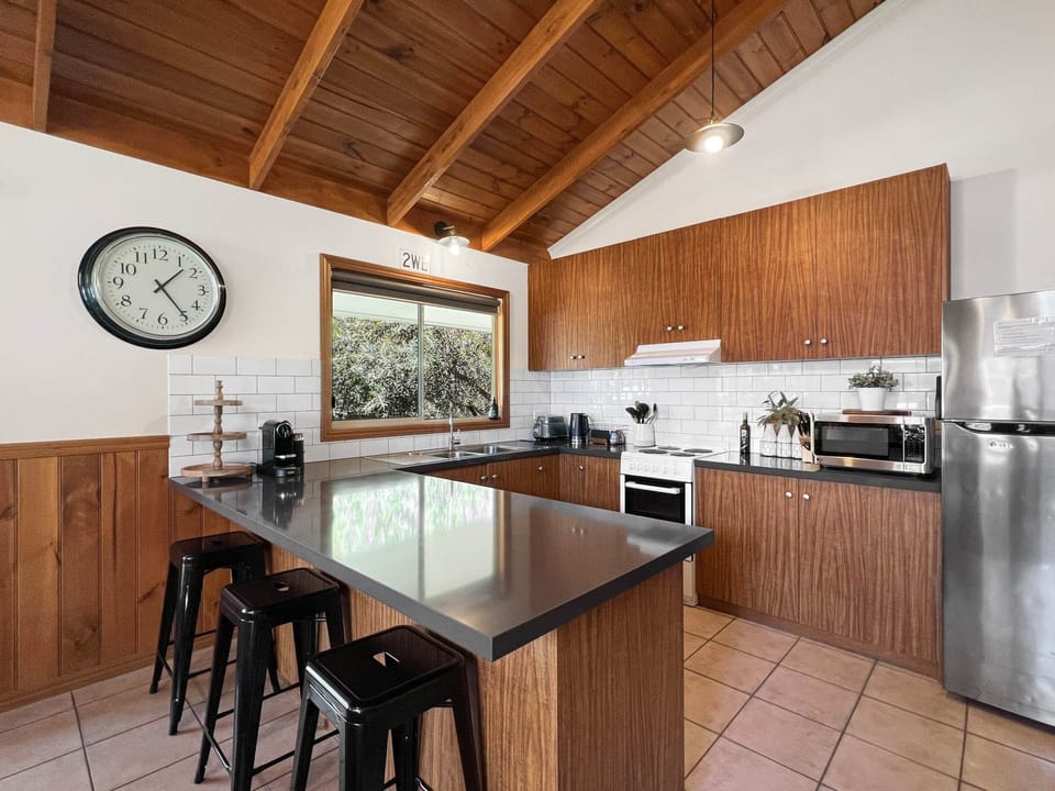 Kitchen bliss: Explore culinary delights with fully-equipped facilities. Elevate your stay! 