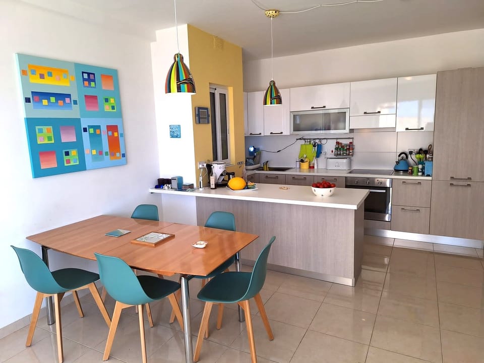 Dining Area and Kitchen with new Table and Chairs